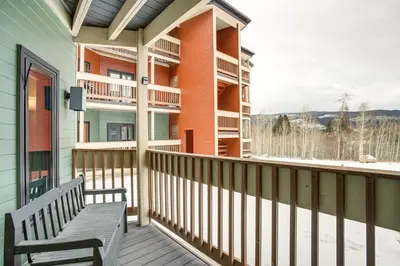 a balcony with a bench and a building at Easy Ski Shuttle Access! Winter Park Mtn Getaway in Winter Park