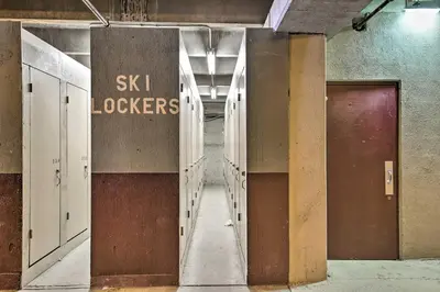 an empty hallway with a sign that says sk ii lockers at Easy Ski Shuttle Access! Winter Park Mtn Getaway in Winter Park