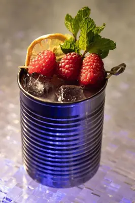 a blue can with raspberries on top of it at Aloft Denver Downtown in Denver