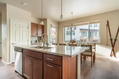 a kitchen with a large island with a counter top at Colorado Haven: 5bd - Pool & Foosball - 10min UCB in Superior