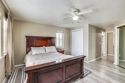 a bedroom with a bed and a ceiling fan at 5 Mi to Keystone Resort Mountain-View Townhome! in Dillon