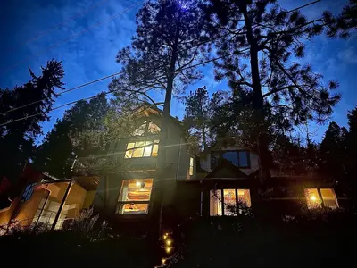 a house at night with the lights on at Morrison Colorado Mountain Getaway - Red Rocks in Morrison
