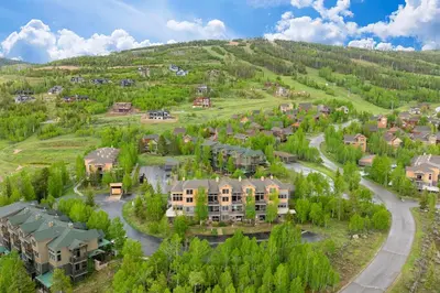 an aerial view of a resort with a mountain at Sundog Condo in Granby Ranch in Granby