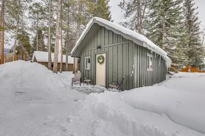 a smallshed covered in snow with a pile of snow around it at 3 Mi to Rocky Mtn Natl Park Grand Lake Cabin in Grand Lake