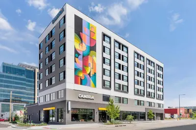 a building with a mural on the side of it at Cambria Hotel Denver Downtown RiNo in Denver