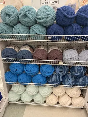 a shelf filled with different colored balls of yarn at Colorado Bed & Breakfast with beautiful views in Evergreen