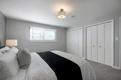 a bedroom with a large bed and a window at Serene 4-Bedroom Getaway in Arvada! Pet-friendly! in Arvada
