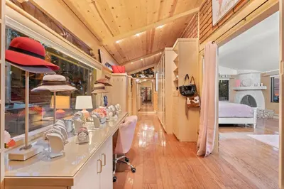 a room with a sink and a room with a bedroom at Mountain Top Luxury Red Rocks Hot tub Sauna Views in Golden