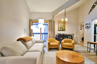 a living room with a couch and a table at Wild Irishman Off-Piste Condo: Great Keystone Getaway in Keystone