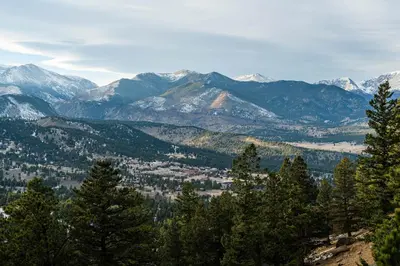 a view of a mountain range with snow covered mountains at Casa de Cristal-Epic Views-HotTub-Sauna-Sleeps 10-Luxury Linens-Stocked Kitchen in Estes Park