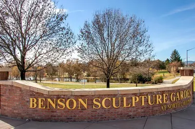 a sign for the entrance to the benson sculpture garden at Charming Home with RV Parking - 30 miles from RMNP! in Loveland
