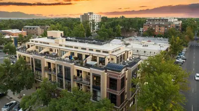 an aerial view of a building in a city at Penthouse with Mountain Views in the Heart of Old Town in Fort Collins