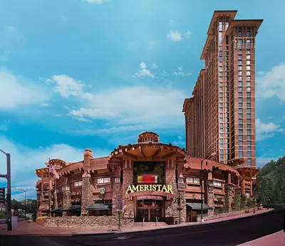 a hotel building with a sign that reads superstar at Ameristar Casino Black Hawk in Black Hawk