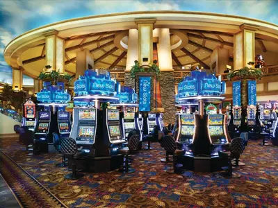 a bunch of slot machines in a casino at Ameristar Casino Black Hawk in Black Hawk