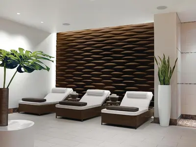 a waiting room with four chairs and a wall at Ameristar Casino Black Hawk in Black Hawk
