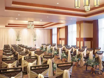 a banquet hall with rows of tables and chairs at Ameristar Casino Black Hawk in Black Hawk