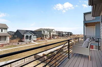 a view from the balcony of a home with houses at Orleans Street - Aurora in Aurora