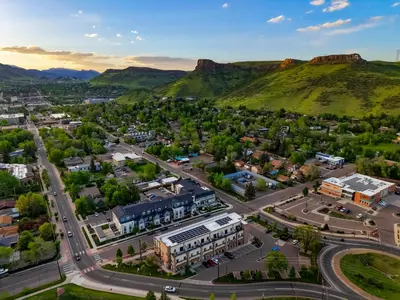 an aerial view of a city with a mountain in the background at Unbeatable Location Golden Condo - Walk Everywhere in Golden
