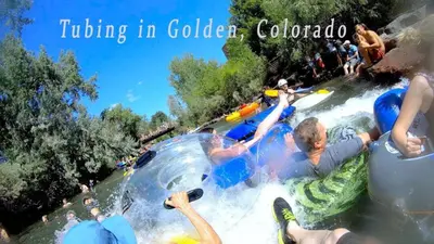a group of people on a ride in a water park at Golden Rooftop w Mountain Views - Walk to DT Golden School of Mines Close to Red Rocks in Golden