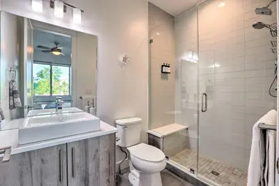 a bathroom with a toilet and a sink and a shower at Golden Rooftop w Mountain Views - Walk to DT Golden School of Mines Close to Red Rocks in Golden
