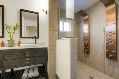 a bathroom with a sink and a shower at Best Experience in Denver HOT TUB and FIRE PIT 4 miles to DT in Denver
