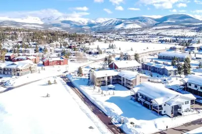 an aerial view of a town in the snow at 2 Mi to Fraser Tubing Hill Condo with Fireplace! in Fraser