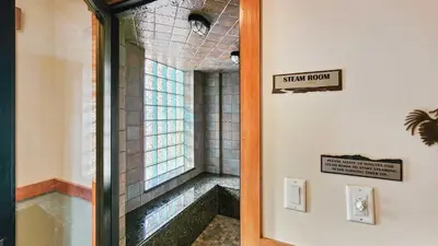 a glass door to a stair room with a window at River Run 2BD Condo Walk to Ski and Lift in Keystone