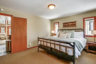 a bedroom with a large bed in a room at Downtown Frisco Townhome about 1 Mi to Lake Dillon! in Frisco