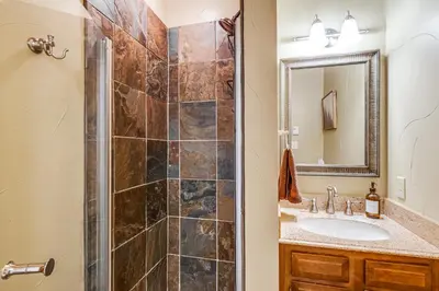 a bathroom with a shower and a sink at Downtown Frisco Townhome about 1 Mi to Lake Dillon! in Frisco