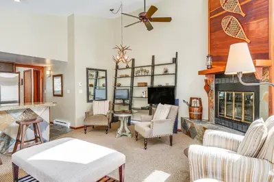a living room filled with furniture and a fireplace at Downtown Frisco Townhome about 1 Mi to Lake Dillon! in Frisco
