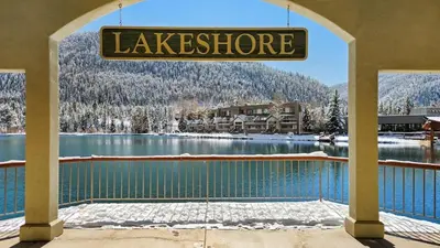 a sign that reads lakekeforne in front of a lake with snow at Lakeside 1BR 4-Min to Keystone Ski Resort in Keystone
