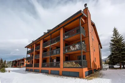 a large apartment building in the snow at Mountainside #272H in Frisco