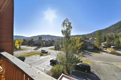 a view of a street with cars parked on the road at Cedar Lodge 309 in Frisco