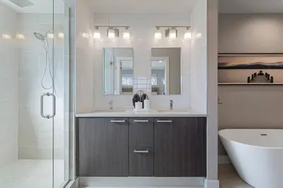 a bathroom with a sink and a shower and a tub at Luxury Home: Monthly Rental House Near Denver in Englewood
