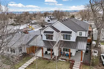 an aerial view of a house with a roof at Luxury Home: Monthly Rental House Near Denver in Englewood