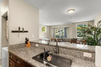 a kitchen with a sink and a counter top at Alpine Ridge A25 by Great Western Lodging in Dillon