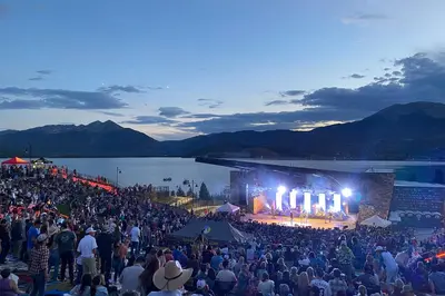 a large crowd of people watching a concert at aestival at Alpine Ridge A25 by Great Western Lodging in Dillon