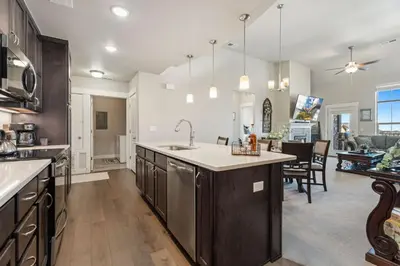 a kitchen with a sink and a counter top at Serene Retreat with Hot Tub, Sauna, Pool & Gym in Windsor