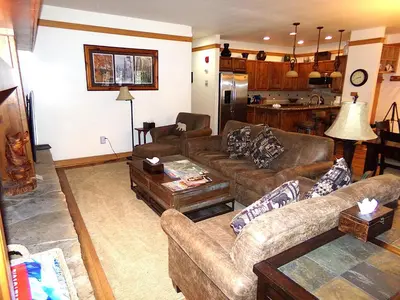 a living room with two couches and a kitchen at Chateau DuMont Oversized 2 Bed 2 Bath CDMR in Keystone