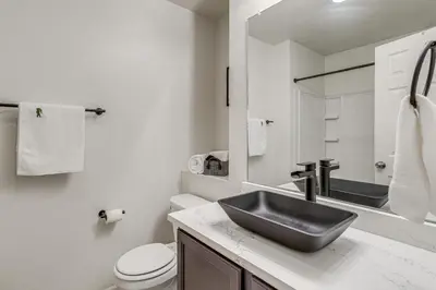 a bathroom with a sink and a toilet at 6 Mi to DIA Denver Home with Fenced Yard and Fire Pit in Aurora