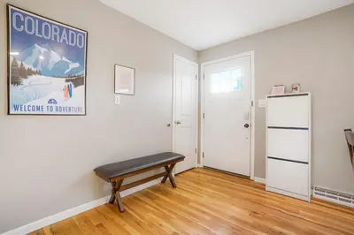 an empty room with a bench and a door at Sweet Arvada Escape - Near Olde Town in Arvada
