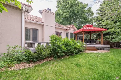 a house with a gazebo in a yard at Luxurious 4BR Retreat - Pool Table & Chic Amenities in Boulder