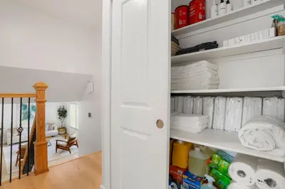 a room with a closet filled with towels at Large Home, 2 Living Rooms, Great for Family/Pets! in Arvada