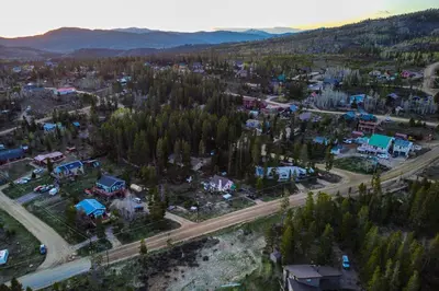 an aerial view of a town with trees and a road at Tabernash Home about 13 Miles to Winter Park! in Tabernash