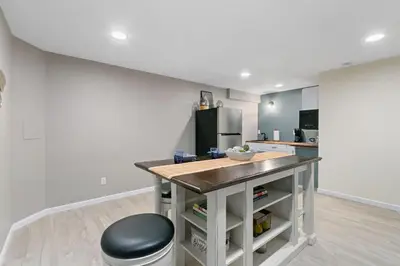 a kitchen with a island in the middle of a room at Colorado Mountain Retreat - Easy access to RMNP! in Loveland