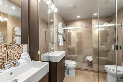a bathroom with a sink and a toilet and a shower at Frisco 8 Townhomes #4 by Great Western Lodging in Frisco