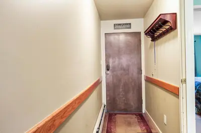 a hallway with a door in a room at Lake Cliffe E201 by Great Western Lodging in Dillon