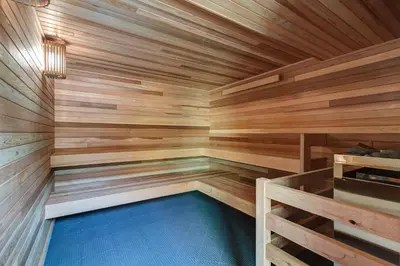 a wooden sauna with a blue pool in it at Mountain View Getaway by Great Western Lodging in Frisco