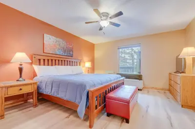 a bedroom with a bed and a ceiling fan at Mountainside B173 by Great Western Lodging in Frisco