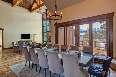 a dining room with a table and chairs at The Observatory by Great Western Lodging in Breckenridge